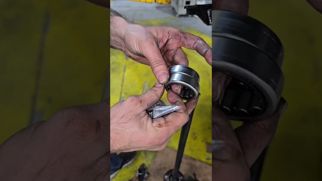 Ford marquis rear axle bearing removal trick #automotive #howto #mechanic #trick